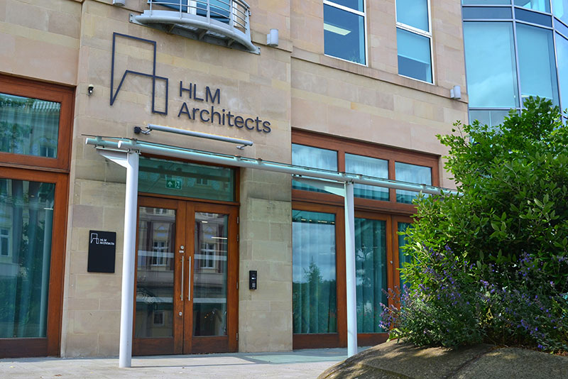 A photo showing the front of the HLM Architects building